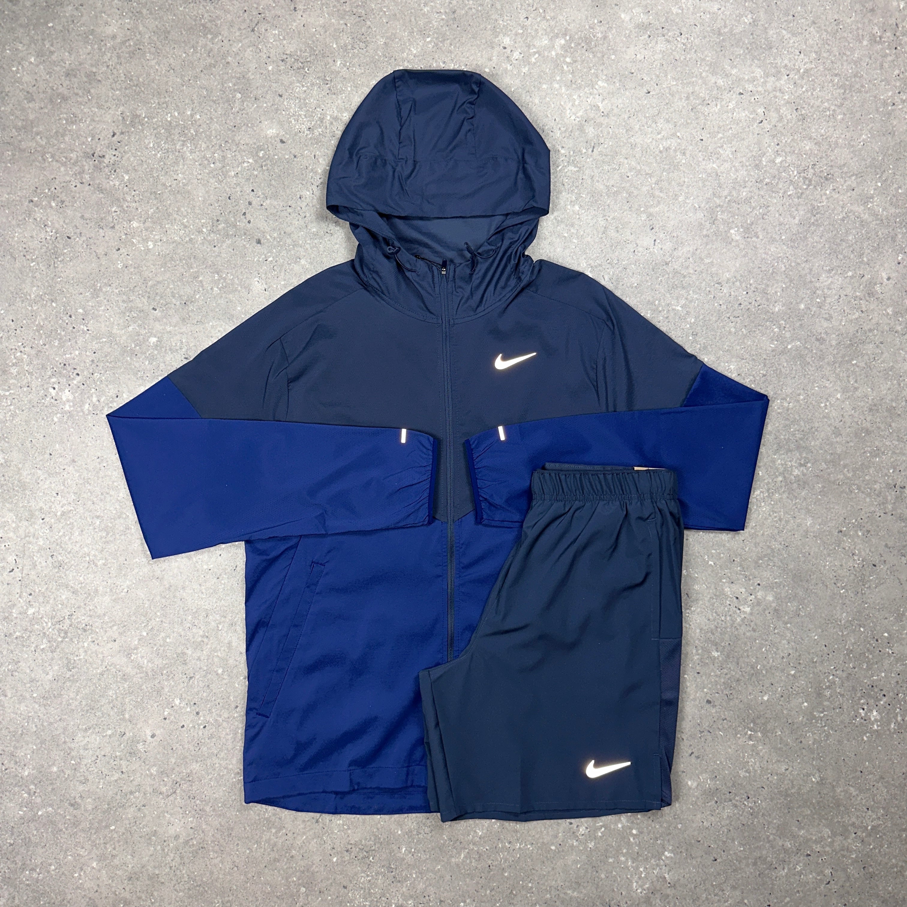navy blue nike windbreaker pants