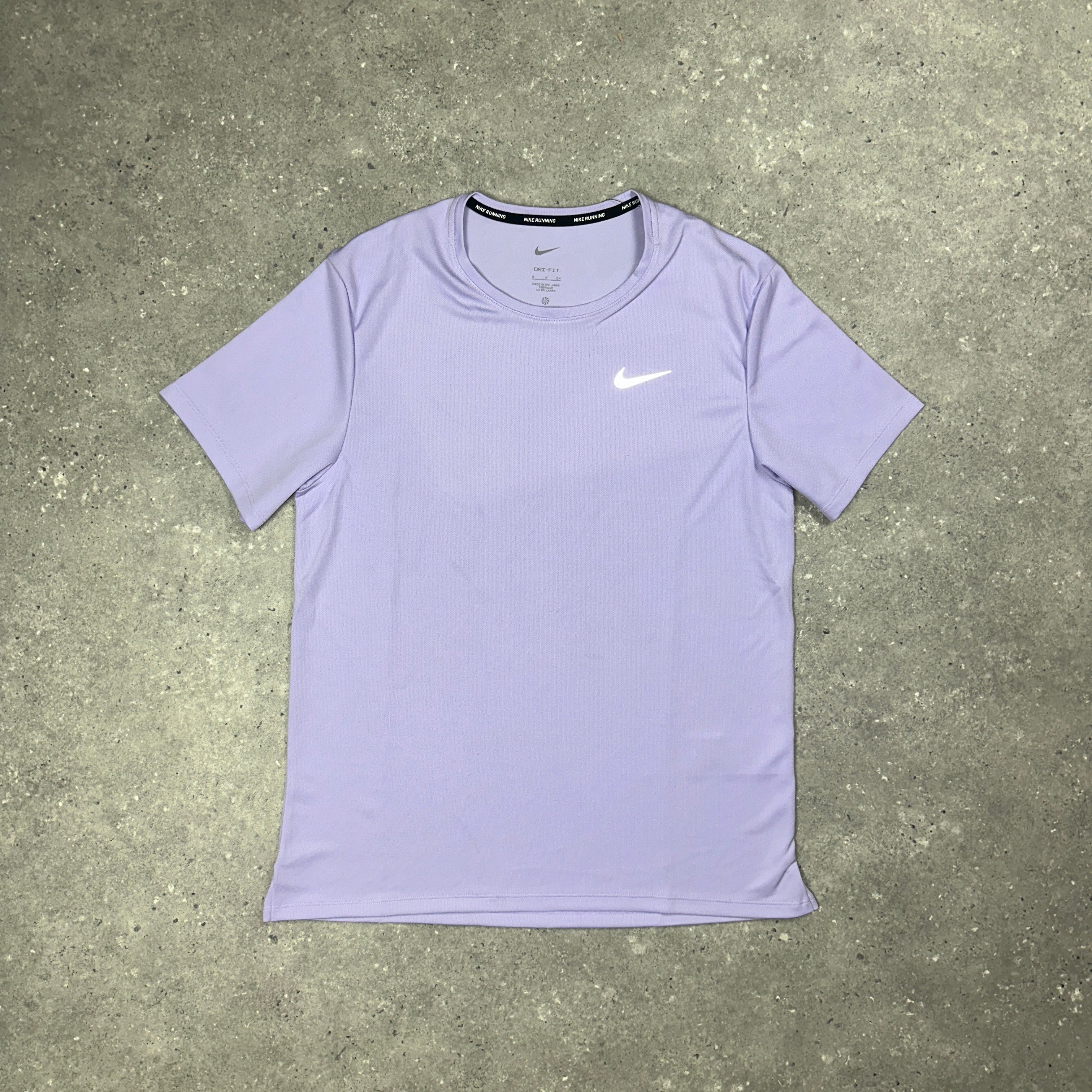 white and lavender nike shirt